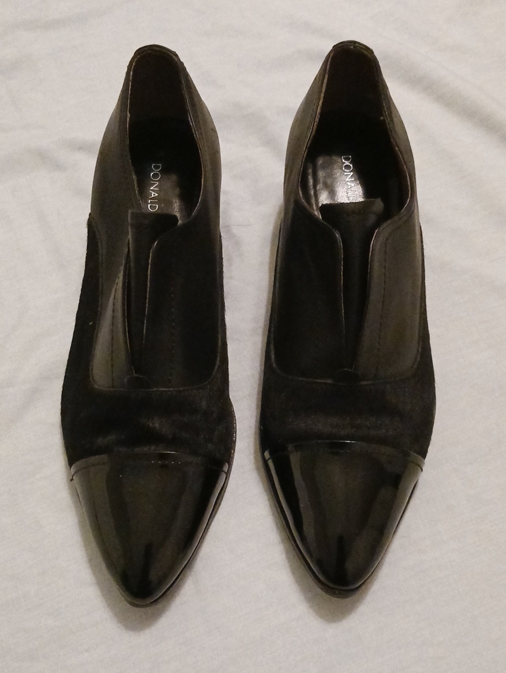 Donald J. Pliner Black Leather & Pony Hair Pointed Toe Flats.